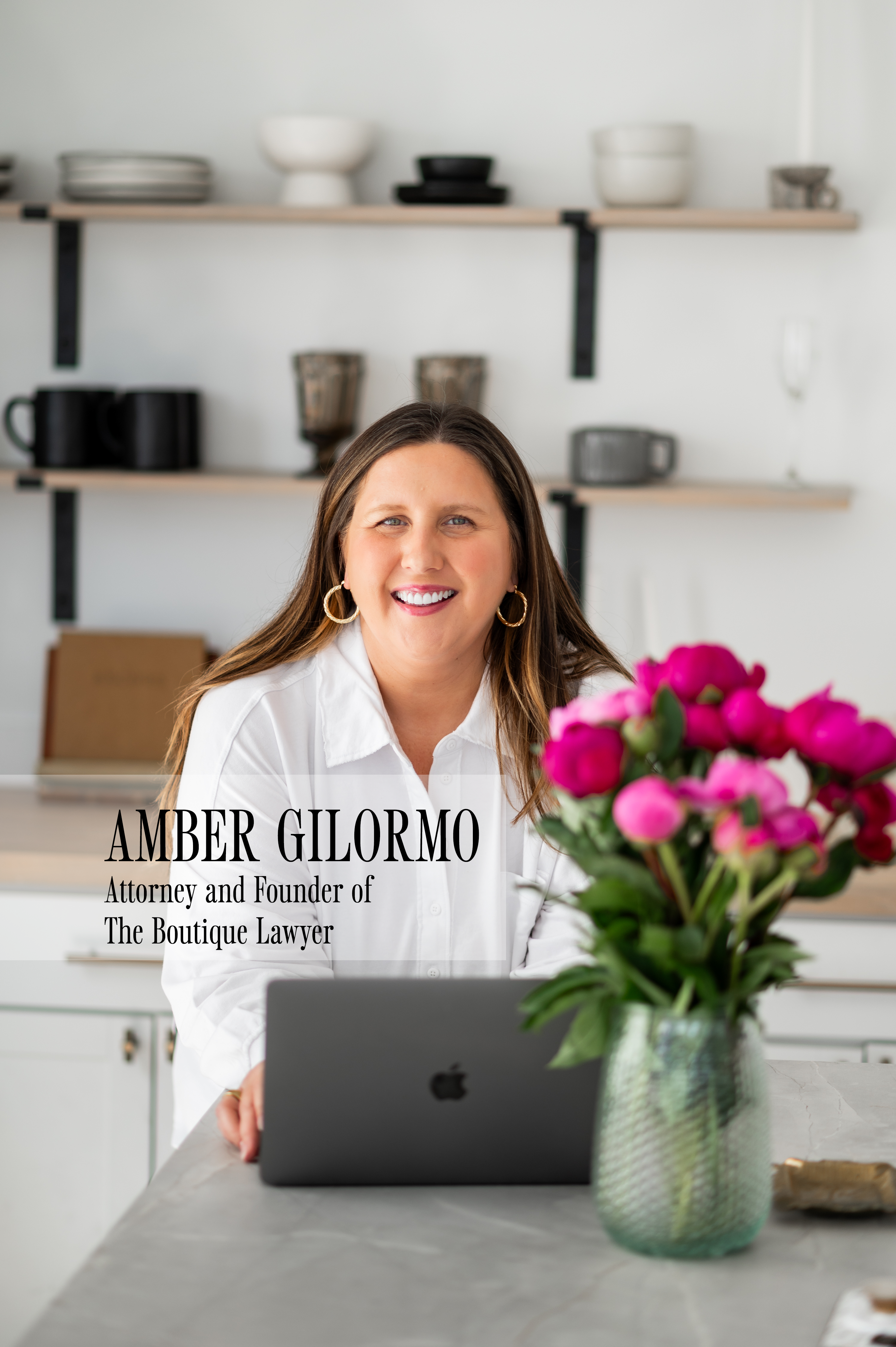 Amber, the attorney and founder of The Boutique Lawyer, a boutique agency providing contract templates for creatives and service providers in the online space.