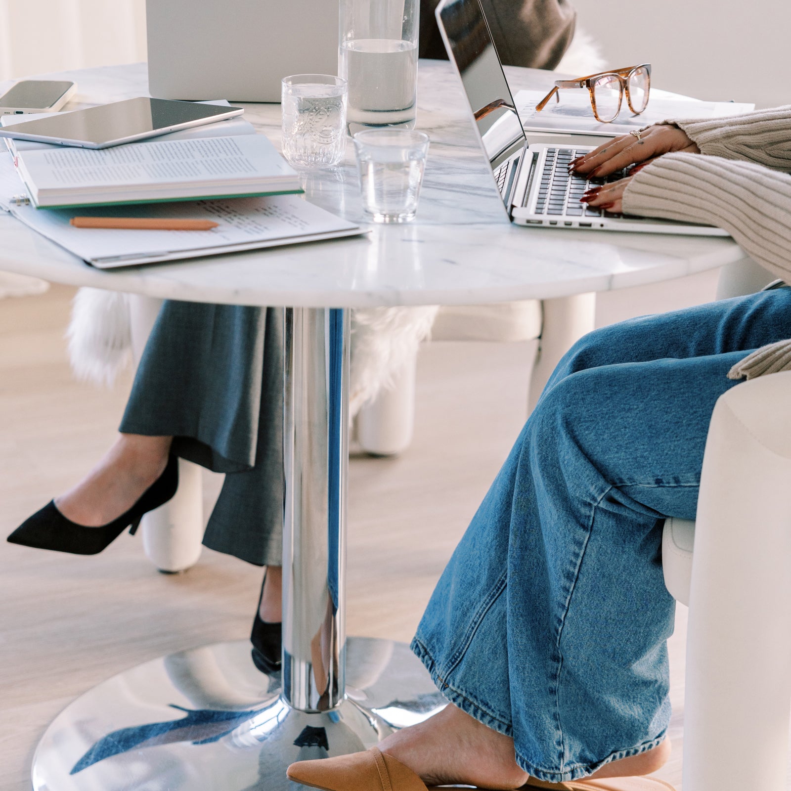 Pair of attorney's getting together to creative contracts and legal templates for creative entrepreneurs and service providers.