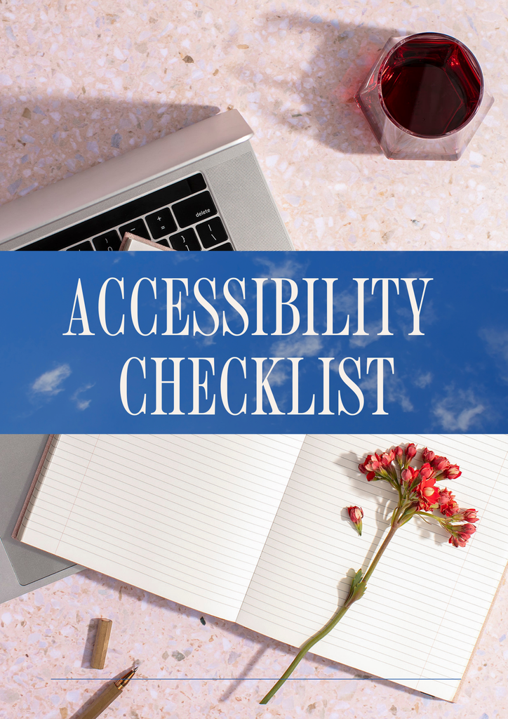 Workspace with "ACCESSIBILITY CHECKLIST" title, laptop, notepad, and red flower on marble background.