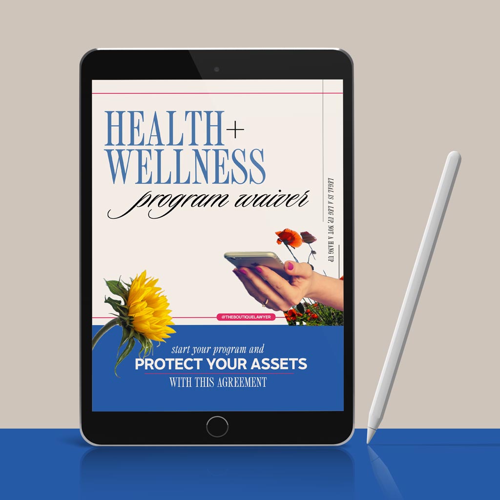 Digital tablet displaying a &quot;Health + Wellness program waiver&quot; with flower and a hand holding a phone, stylus beside it.