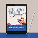 Digital tablet displaying a "Social Media Outreach agreement" with flower and a hand holding a phone, stylus beside it.